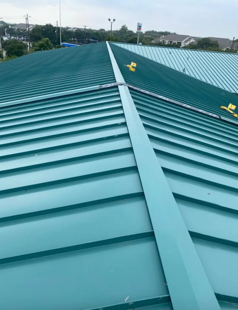Green commercial metal roof ridge and valley for Metal Roof Repair in Magna